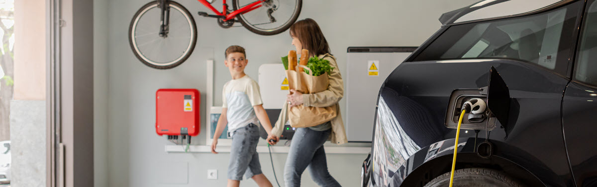 EV car charging in a family garage